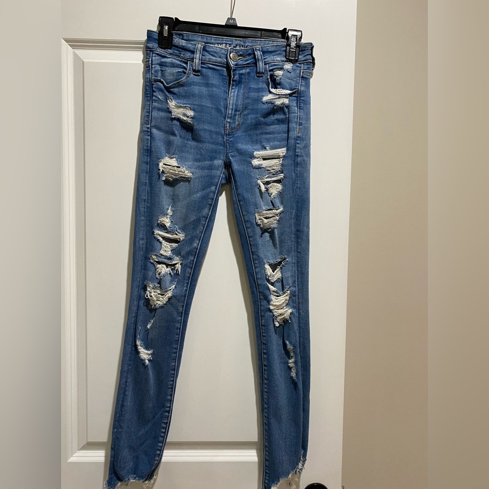American Eagle - next level stretch distressed skinny jeans - size 4 regular